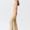 Minivestido de punto transparente con lentejuelas – Beige dorado