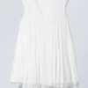 Minivestido holgado con cuello en V – Blanco Minivestido holgado con cuello en V – Blanco