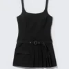 Minivestido plisado con cinturón – Negro Minivestido plisado con cinturón – Negro