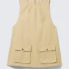 Minivestido tipo pichi de lona de algodón de estilo utilitario – Amarillo claro