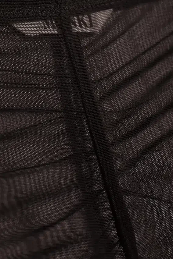 Pantalones acampanados de malla estampada – Marrón oscuro Pantalones acampanados de malla estampada – Marrón oscuro