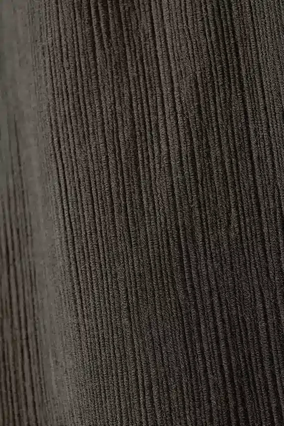 Pantalones acampanados de talle bajo y efecto arrugado – Gris oscuro Pantalones acampanados de talle bajo y efecto arrugado – Gris oscuro