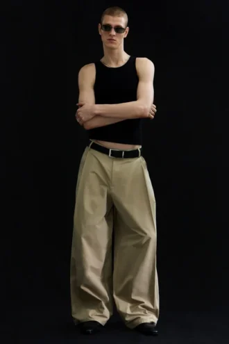Pantalones anchos de corte holgado con pliegues – Beige