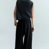Pantalones anchos de corte holgado con pliegues – Negro Pantalones anchos de corte holgado con pliegues – Negro