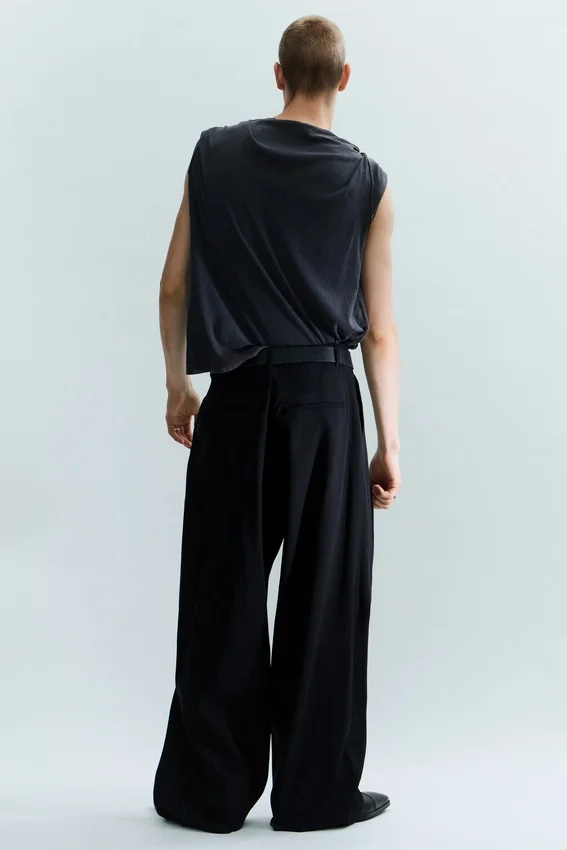 Pantalones anchos de corte holgado con pliegues – Negro Pantalones anchos de corte holgado con pliegues – Negro