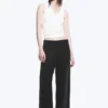Pantalones anchos de talle bajo con efecto arrugado – Negro