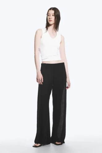 Pantalones anchos de talle bajo con efecto arrugado – Negro