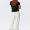 Pantalones bombachos de talle bajo con ribete de encaje de Rosabel – Blanco Pantalones bombachos de talle bajo con ribete de encaje de Rosabel – Blanco