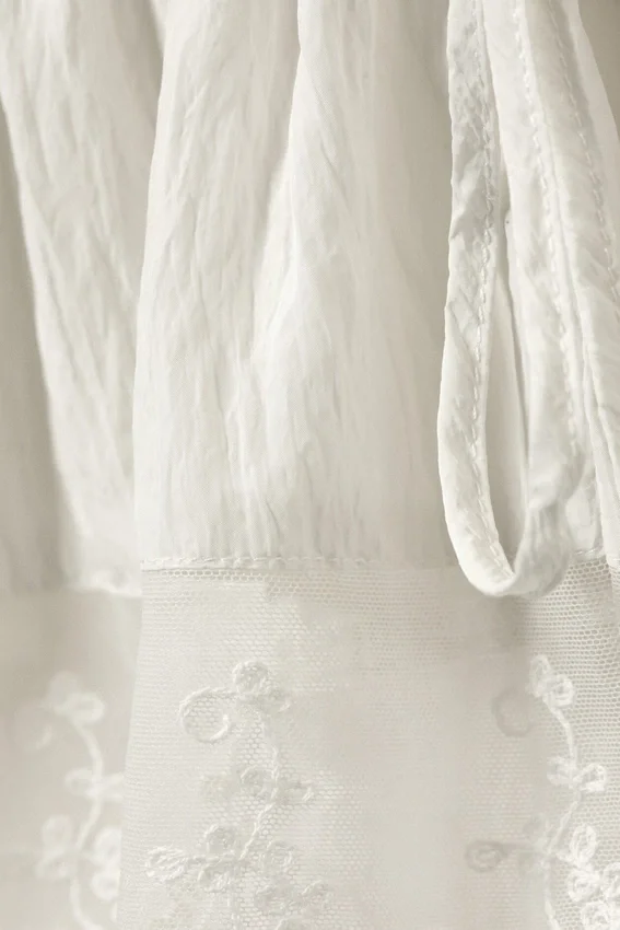 Pantalones bombachos de talle bajo con ribete de encaje de Rosabel – Blanco Pantalones bombachos de talle bajo con ribete de encaje de Rosabel – Blanco