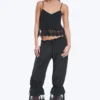 Pantalones bombachos holgados de talle bajo con ribete de encaje de Rosabel – Negro Pantalones bombachos holgados de talle bajo con ribete de encaje de Rosabel – Negro