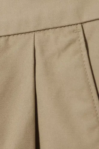 Pantalones chinos de sarga de algodón plisados oversize Otis – Beige
