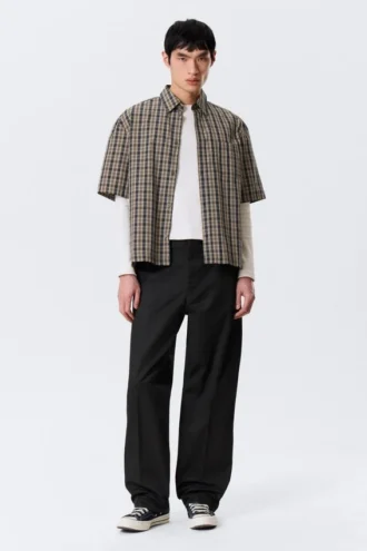 Pantalones chinos de talle medio y corte recto holgado – Negro