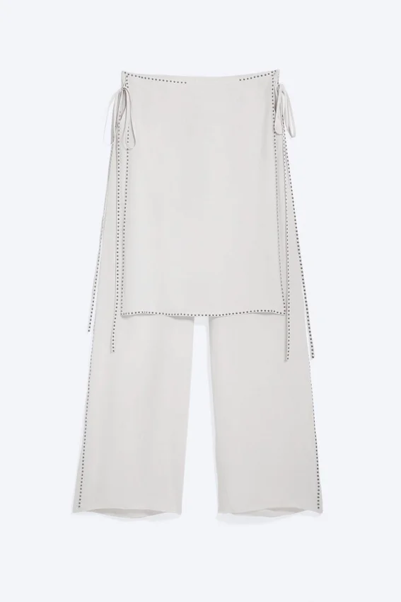 Pantalones con falda de talle medio y tachuelas – Blanco roto Pantalones con falda de talle medio y tachuelas – Blanco roto
