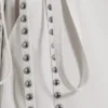 Pantalones con falda de talle medio y tachuelas – Blanco roto Pantalones con falda de talle medio y tachuelas – Blanco roto