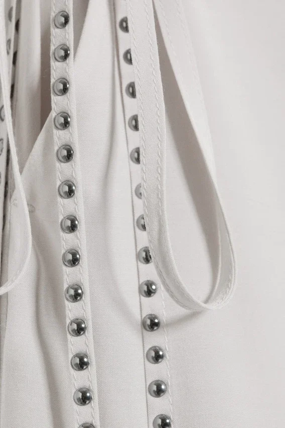 Pantalones con falda de talle medio y tachuelas – Blanco roto Pantalones con falda de talle medio y tachuelas – Blanco roto