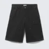 Pantalones cortos de carpintero de talle bajo y corte holgado, lavados – Negro Pantalones cortos de carpintero de talle bajo y corte holgado, lavados – Negro