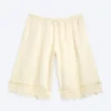 Pantalones cortos de encaje satinado – Blanco apagado
