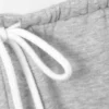 Pantalones cortos de felpa de corte holgado y talle bajo – Gris jaspeado Pantalones cortos de felpa de corte holgado y talle bajo – Gris jaspeado