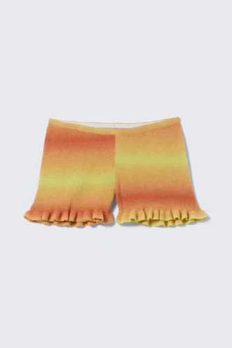 Pantalones cortos de punto con efecto dip-dye y talle bajo – Naranja y amarillo