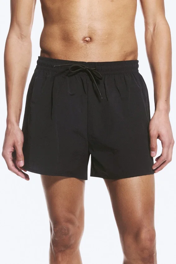 Pantalones cortos estructurados a media pierna – Negro Pantalones cortos estructurados a media pierna – Negro