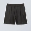 Pantalones cortos holgados con bloques de color – Negro