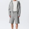 Pantalones cortos holgados de tejido scuba – Gris jaspeado Pantalones cortos holgados de tejido scuba – Gris jaspeado