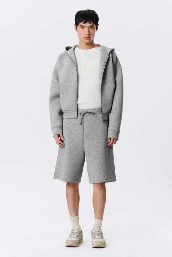 Pantalones cortos holgados de tejido scuba – Gris jaspeado Pantalones cortos holgados de tejido scuba – Gris jaspeado