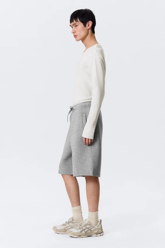 Pantalones cortos holgados de tejido scuba – Gris jaspeado Pantalones cortos holgados de tejido scuba – Gris jaspeado