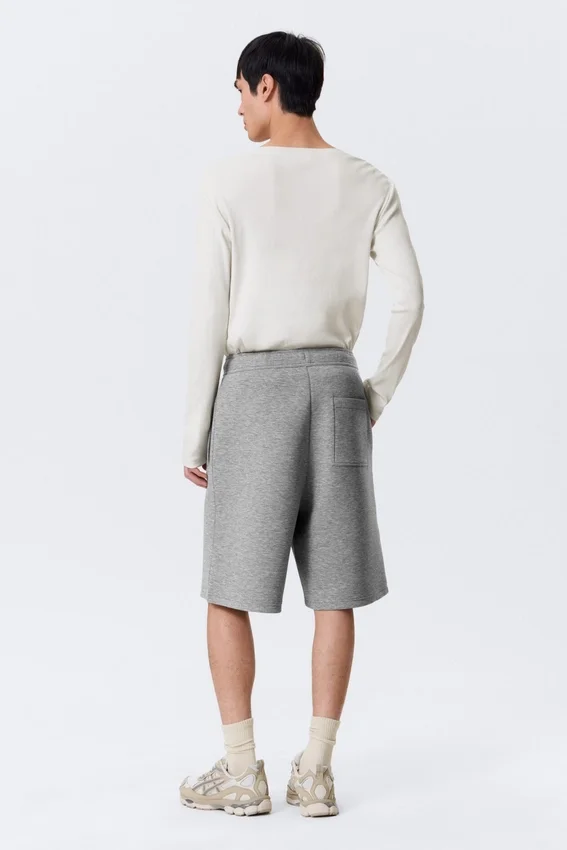 Pantalones cortos holgados de tejido scuba – Gris jaspeado Pantalones cortos holgados de tejido scuba – Gris jaspeado