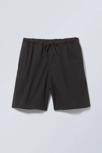 Pantalones cortos holgados tipo paracaídas – Negro