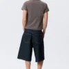 Pantalones cortos vaqueros holgados de talle medio Astro Loose Baggy – Blue Rinse – Azul oscuro Pantalones cortos vaqueros holgados de talle medio Astro Loose Baggy – Blue Rinse – Azul oscuro