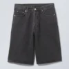 Pantalones cortos vaqueros holgados de talle medio Astro Loose Baggy – Negro Tuned Pantalones cortos vaqueros holgados de talle medio Astro Loose Baggy – Negro Tuned
