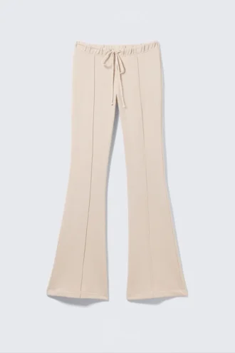 Pantalones de chándal acampanados con pinzas y talle medio – Beige claro Pantalones de chándal acampanados con pinzas y talle medio – Beige claro