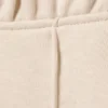 Pantalones de chándal acampanados con pinzas y talle medio – Beige claro Pantalones de chándal acampanados con pinzas y talle medio – Beige claro