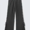Pantalones de chándal anchos de algodón con cordones – Gris oscuro Pantalones de chándal anchos de algodón con cordones – Gris oscuro