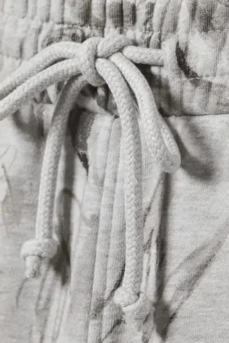 Pantalones de chándal de algodón de corte holgado – Gris jaspeado – Estampado de garabatos
