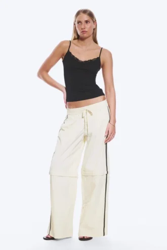 Pantalones de chándal de nailon con cremallera desmontable – Beige – Rayas negras