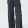 Pantalones de chándal de nailon con cremallera desmontable – Negro – Rayas beige Pantalones de chándal de nailon con cremallera desmontable – Negro – Rayas beige