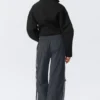Pantalones de chándal de nailon con cremallera desmontable – Negro – Rayas beige Pantalones de chándal de nailon con cremallera desmontable – Negro – Rayas beige