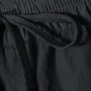 Pantalones de chándal de nailon con cremallera desmontable – Negro – Rayas beige Pantalones de chándal de nailon con cremallera desmontable – Negro – Rayas beige