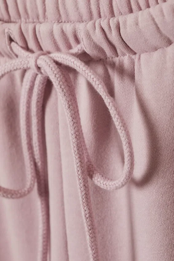 Pantalones de chándal de talle bajo y pierna ancha – Rosa empolvado claro Pantalones de chándal de talle bajo y pierna ancha – Rosa empolvado claro