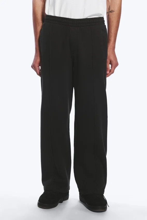 Pantalones de chándal holgados con pliegue delantero – Negro lavado Pantalones de chándal holgados con pliegue delantero – Negro lavado
