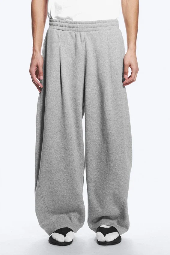 Pantalones de chándal holgados con pliegues – Gris jaspeado Pantalones de chándal holgados con pliegues – Gris jaspeado