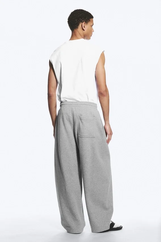 Pantalones de chándal holgados con pliegues – Gris jaspeado Pantalones de chándal holgados con pliegues – Gris jaspeado