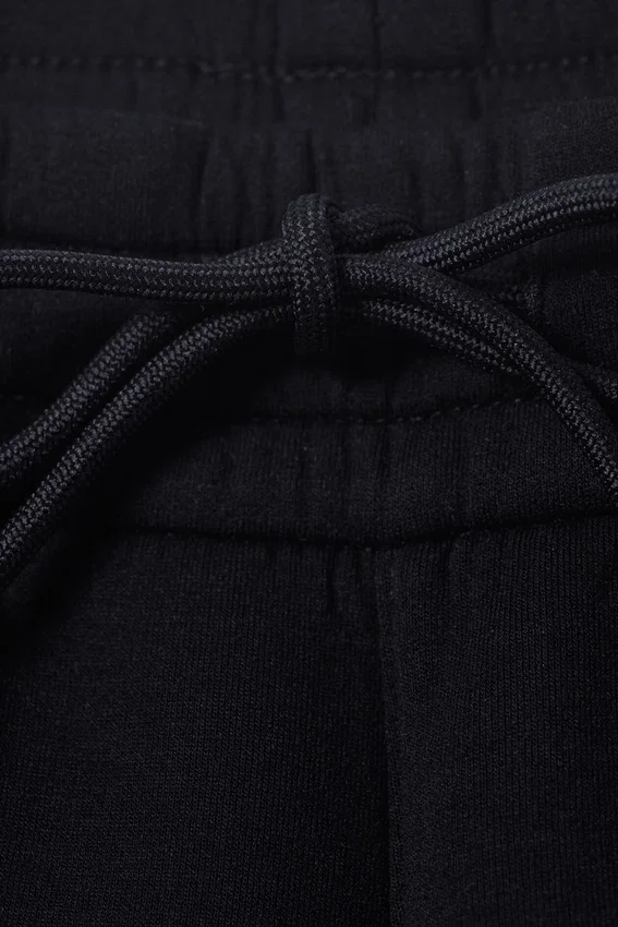 Pantalones de chándal holgados de neopreno – Negro Pantalones de chándal holgados de neopreno – Negro