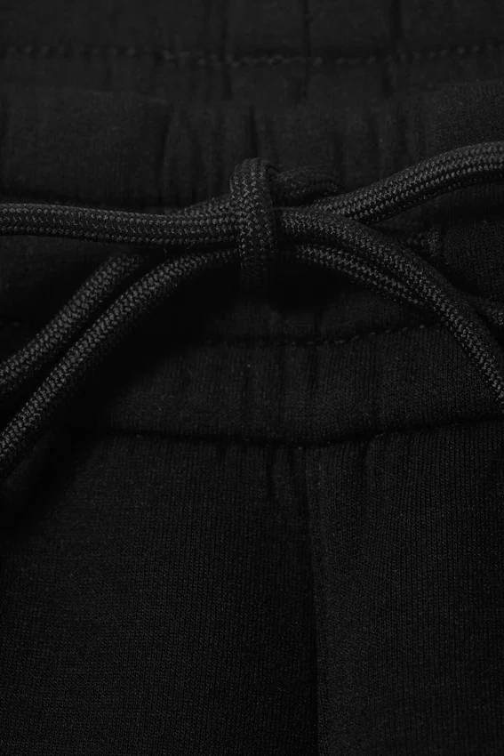 Pantalones de chándal holgados de neopreno – Negro Pantalones de chándal holgados de neopreno – Negro