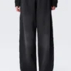 Pantalones de chándal holgados de talle medio con estampados y tachuelas – Negro con tachuelas Pantalones de chándal holgados de talle medio con estampados y tachuelas – Negro con tachuelas