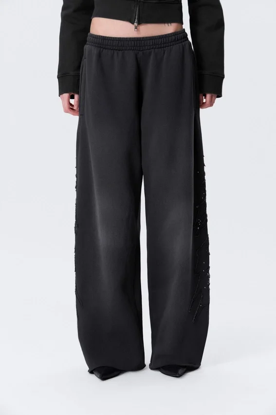 Pantalones de chándal holgados de talle medio con estampados y tachuelas – Negro con tachuelas Pantalones de chándal holgados de talle medio con estampados y tachuelas – Negro con tachuelas
