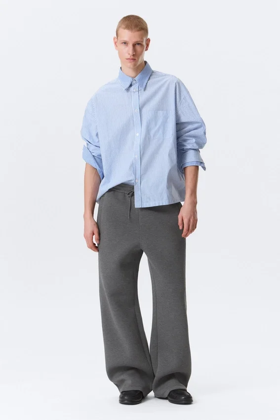 Pantalones de chándal holgados de tejido scuba – Gris oscuro jaspeado Pantalones de chándal holgados de tejido scuba – Gris oscuro jaspeado