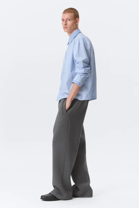 Pantalones de chándal holgados de tejido scuba – Gris oscuro jaspeado Pantalones de chándal holgados de tejido scuba – Gris oscuro jaspeado